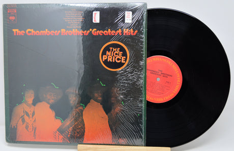 Vinyl record with cover featuring 'The Chambers Brothers' Greatest Hits' and 'The Nice Price' label.
