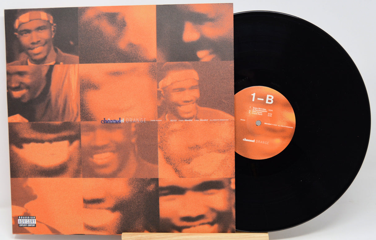 Channel Orange front album cover and vinyl record with iconic orange and black artwork