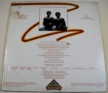 Back cover of Chanson vinyl album featuring tracklist and band photo