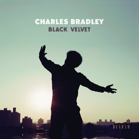 Album cover with silhouette of a person against a city skyline and sunset, featuring 'Charles Bradley Black Velvet' text.