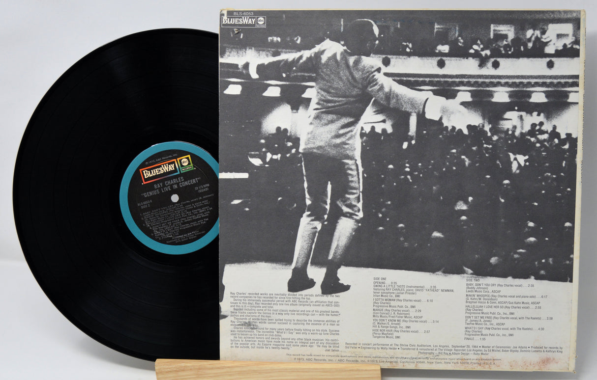 Vinyl record with a black and white image of a person on the cover