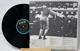 Vinyl record with a black and white image of a person on the cover