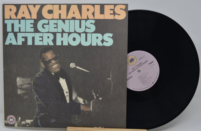 Vinyl record with 'Ray Charles The Genius After Hours' cover showing a musician with sunglasses.