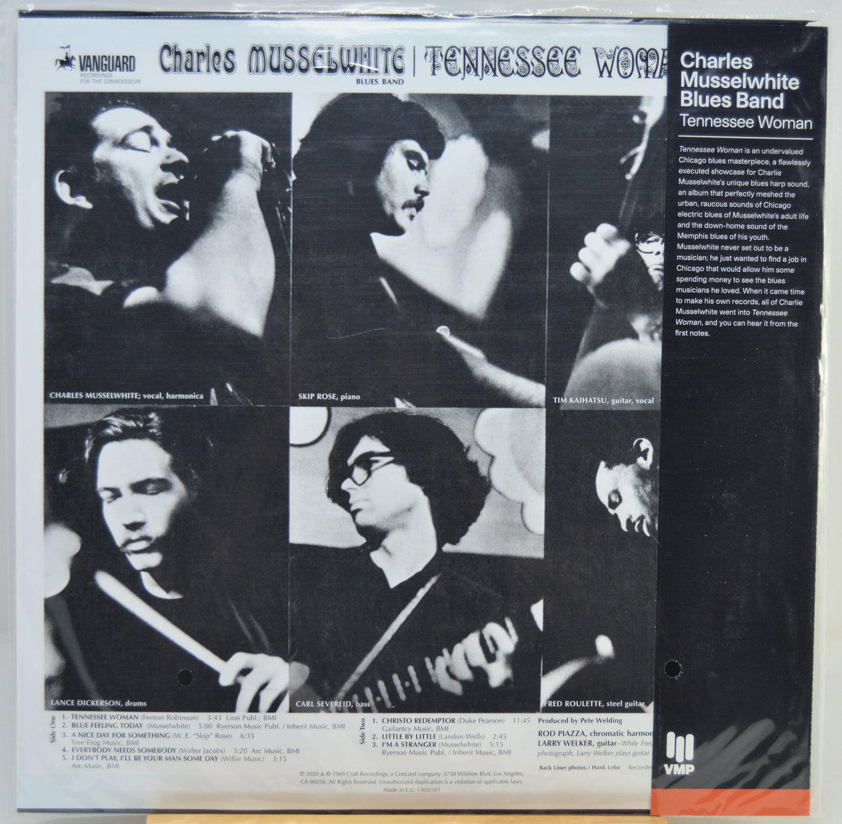 The back cover of a vinyl record sleeve for Charles Musselwhite / Tennessee Woman Blues, showing black-and-white band member photos, track listing text, and a dark right panel with release details.
