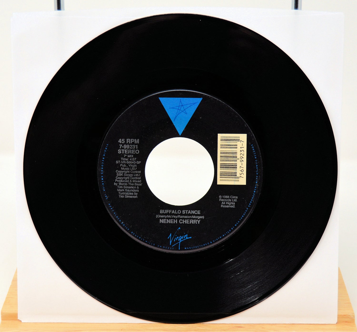 Vinyl record with label on a white background