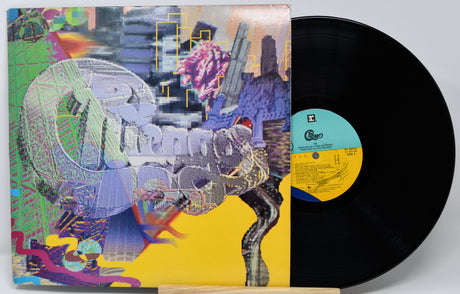 Vinyl record with a colorful cover featuring abstract designs.