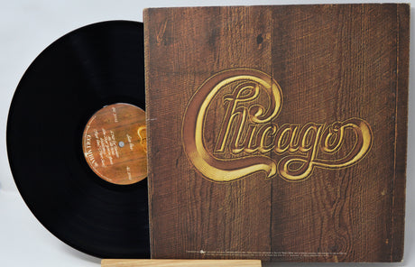Vinyl record with wooden cover featuring 'Chicago' logo