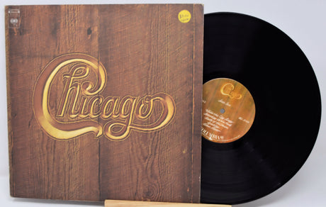 Vinyl record with wooden cover featuring 'Chicago' logo