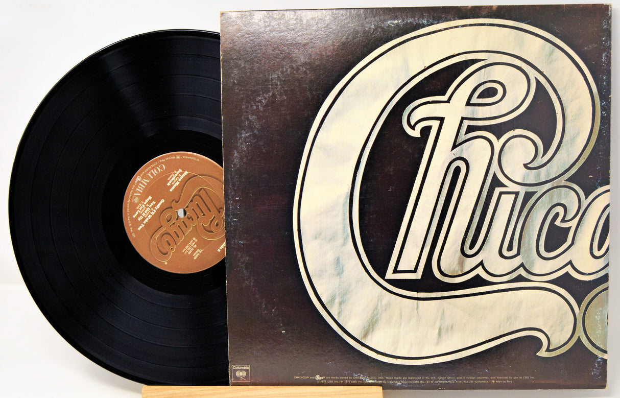 Vinyl record with a 'Chicago' album cover on a white background