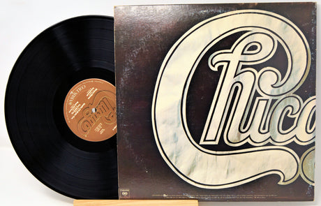 Vinyl record with a 'Chicago' album cover on a white background