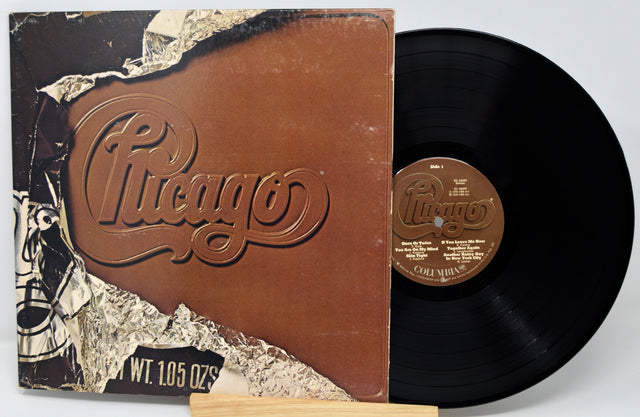 Vinyl record with 'Chicago' album cover on a white background