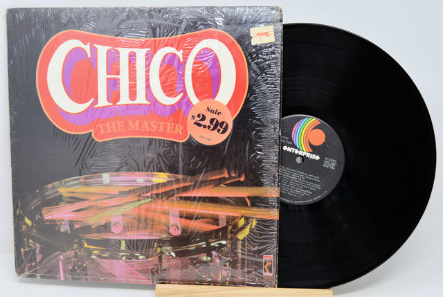 Vinyl record with cover featuring 'Chico the Master' on a light gray background