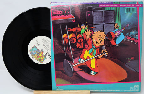 Vinyl record with colorful cover featuring a cartoon character playing guitar.