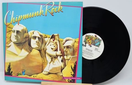 Vinyl record with 'Chipmunk Rock' cover featuring cartoon characters around a mountainous landscape.