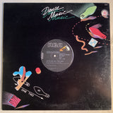 Front cover of Chocolate Milk 12-inch single with 'Let's Go All The Way' on RCA Victor, colorful Dance Music sleeve