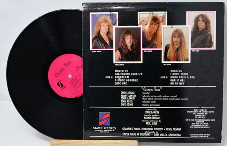 Vinyl record with a black cover featuring album artwork and text.