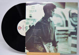 'Chris Isaak Self Titled' Vinyl record with a cover featuring him standing in front of a train.