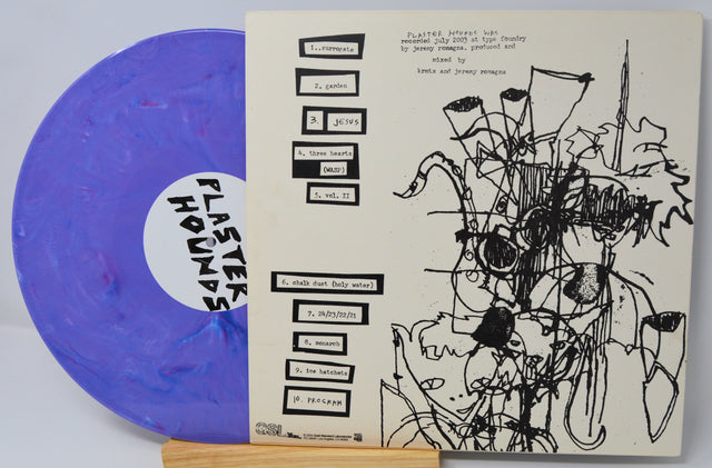 Back cover of Chromatics Plaster Hounds album with purple vinyl and tracklist