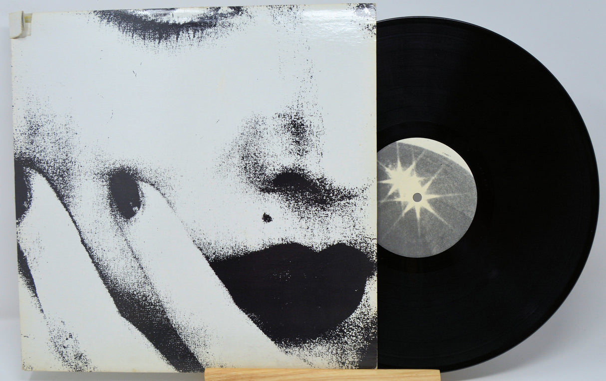 Ciccone Youth The Whitey Album alternate sleeve artwork with a stylized face and vinyl record