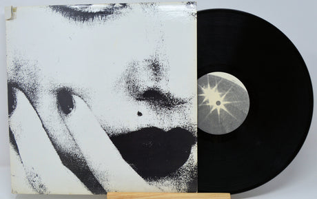 Ciccone Youth The Whitey Album alternate sleeve artwork with a stylized face and vinyl record