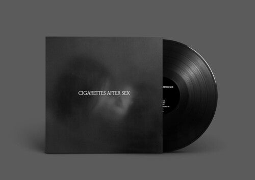 Vinyl record and cover with 'Cigarettes After Sex' text on a gray background