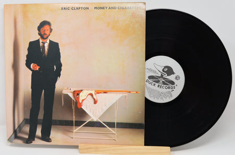 Vinyl record with cover featuring Eric Clapton and 'Duck Records' label.