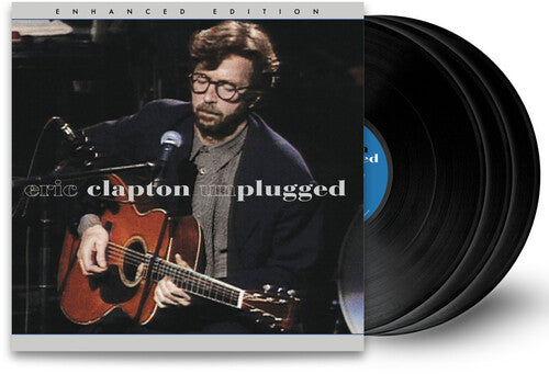 Vinyl record with cover featuring Eric Clapton playing guitar, labeled 'Unplugged'.