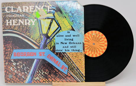 Front cover of Clarence Frogman Henry's vinyl album featuring Bourbon St. and Canal St. signs with vibrant art
