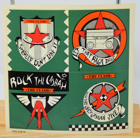 Collection of The Clash stickers on a green background