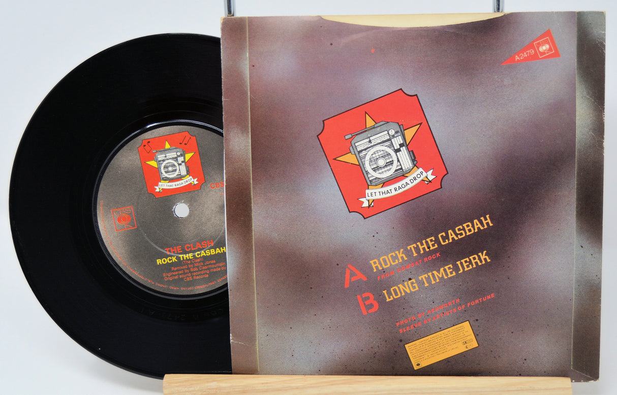 Vinyl record with cover featuring text and graphics on a white background