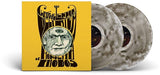 Album cover with a stylized face and text on a yellow background