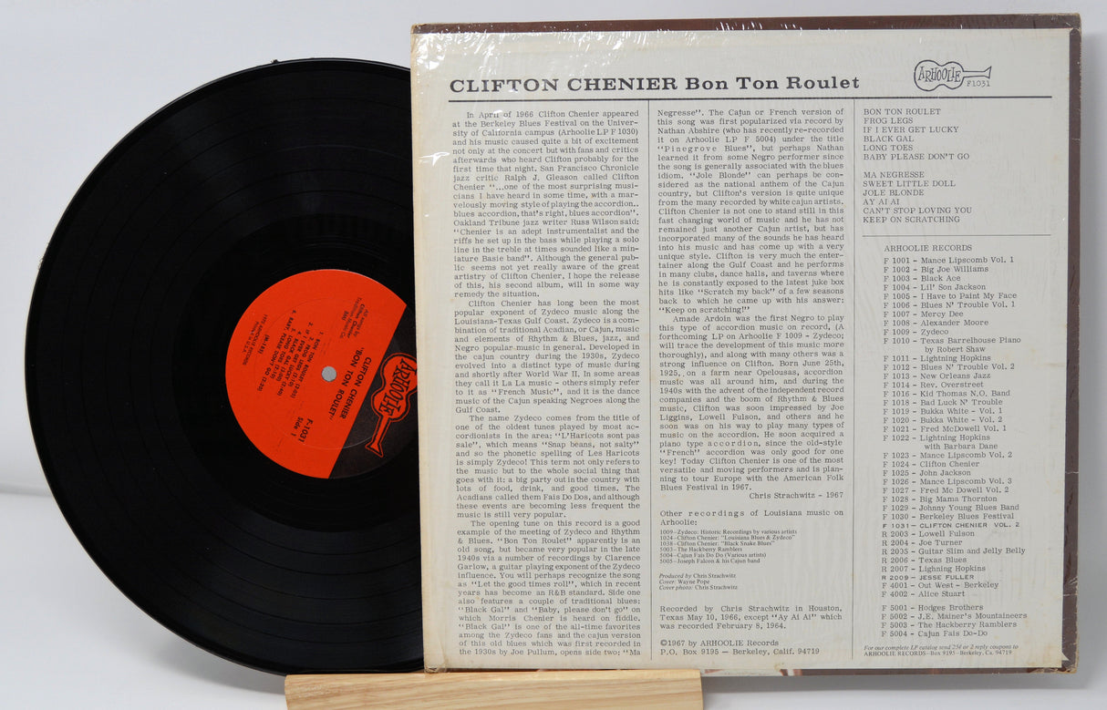 Back cover and vinyl record of Clifton Chenier's Bon Ton Roulet LP showing tracklist and album notes