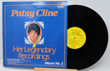 Vinyl record with blue cover featuring Patsy Cline's portrait and album details.