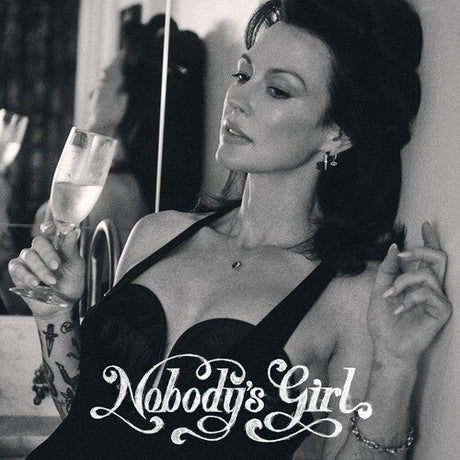 Close-up of Nobody's Girl album cover showing a sophisticated woman with a drink