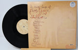 Back cover and vinyl record for CocoRosie’s 'The Adventures of Ghosthorse and Stillborn' featuring tracklist in handwritten script