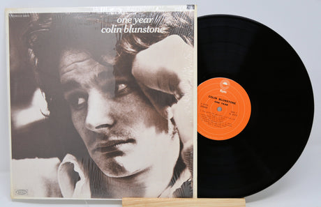 Front cover and vinyl record of Colin Blunstone's 'One Year' album with sepia-toned artist portrait