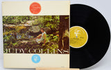 Vinyl record with cover featuring a person in nature and 'Judy Collins' text.