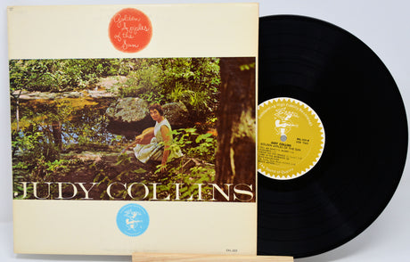Vinyl record with cover featuring a person in nature and 'Judy Collins' text.