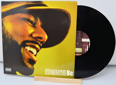 Front cover of Common's 'Be' vinyl LP featuring a close-up of Common smiling