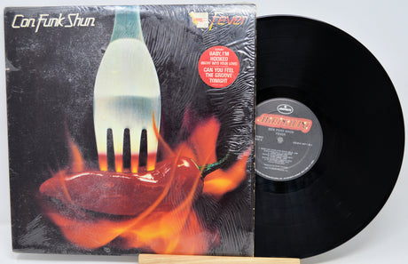 Vinyl record with a fiery design and a fork, featuring the band 'Can Funk Shun'.