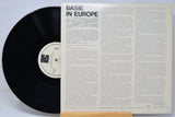 Vinyl record with 'Basie in Europe' cover on a light gray background