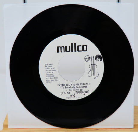 Vinyl record with a colorful album cover on a white background