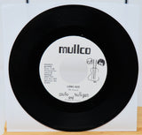 Vinyl record with a dramatic cover featuring a close-up of a person's face.