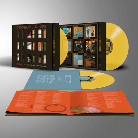 Cowboy Junkies vinyl record with booklets on a gray background