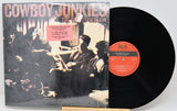 Vinyl record with cover titled 'Cowboy Junkies The Thirty Session' on a white background