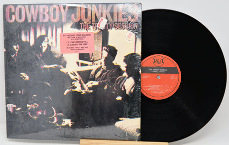 Vinyl record with cover titled 'Cowboy Junkies The Thirty Session' on a white background