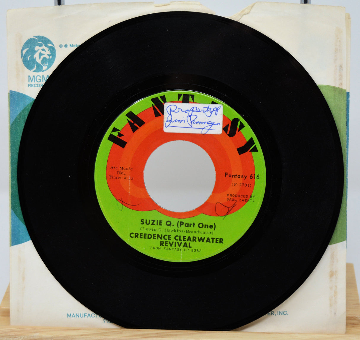 Side one of Creedence Clearwater Revival Suzie Q. 45 RPM record, with vintage Fantasy label and original sleeve