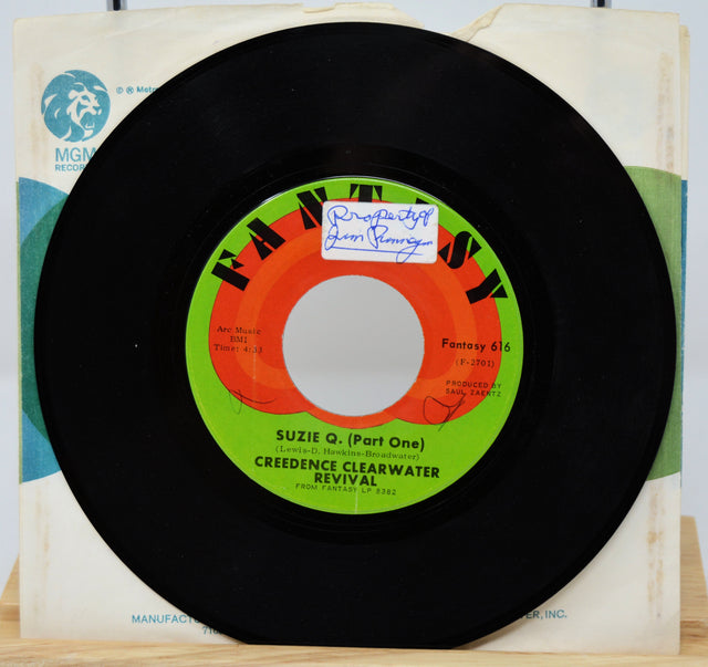 Side one of Creedence Clearwater Revival Suzie Q. 45 RPM record, with vintage Fantasy label and original sleeve