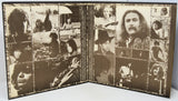 Album cover with collage of a musician and band members in sepia tones.
