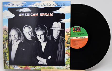 Vinyl record with cover featuring four band members and 'American Dream' text.